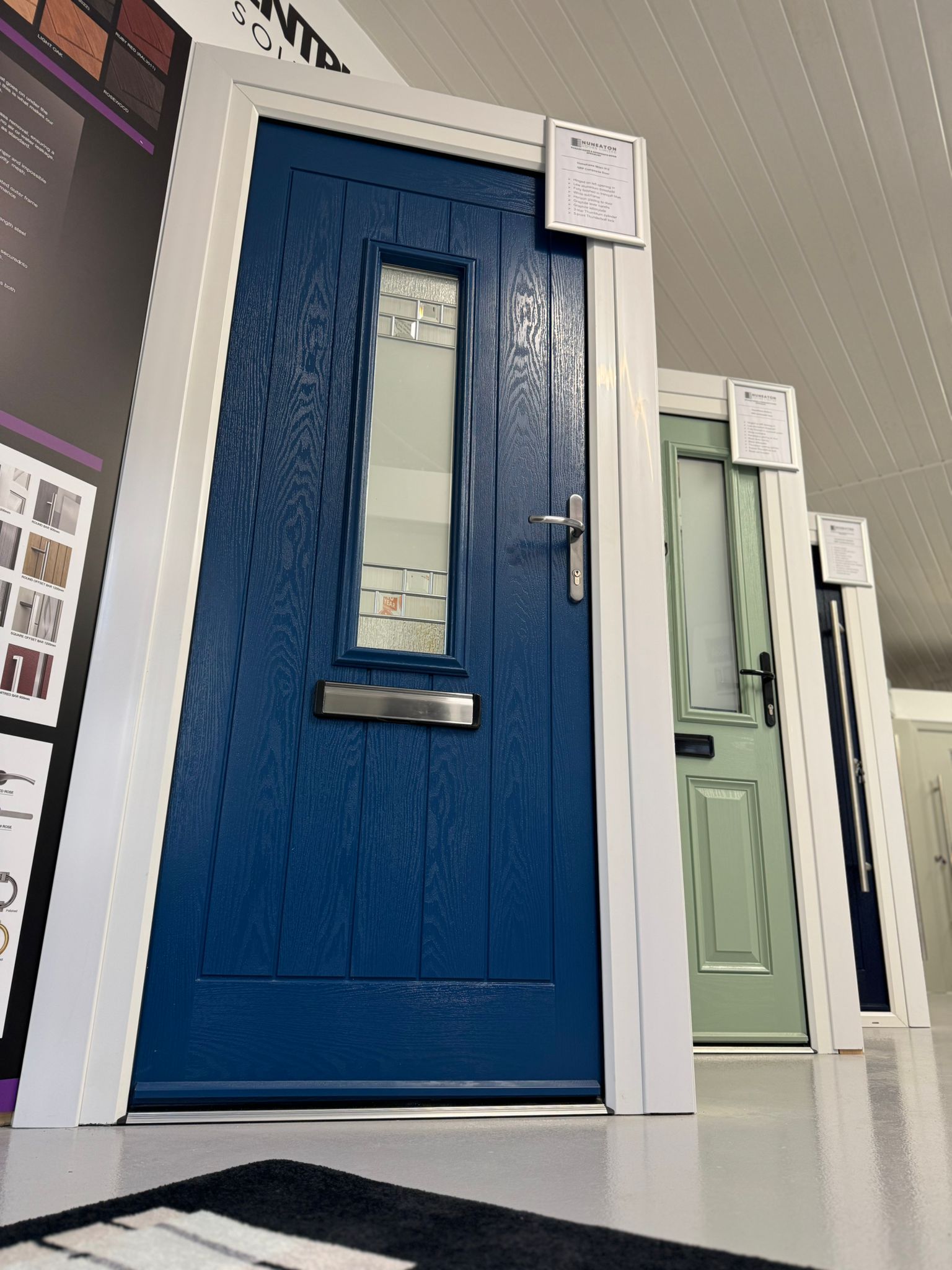 Image of 3 composite doors in showroom