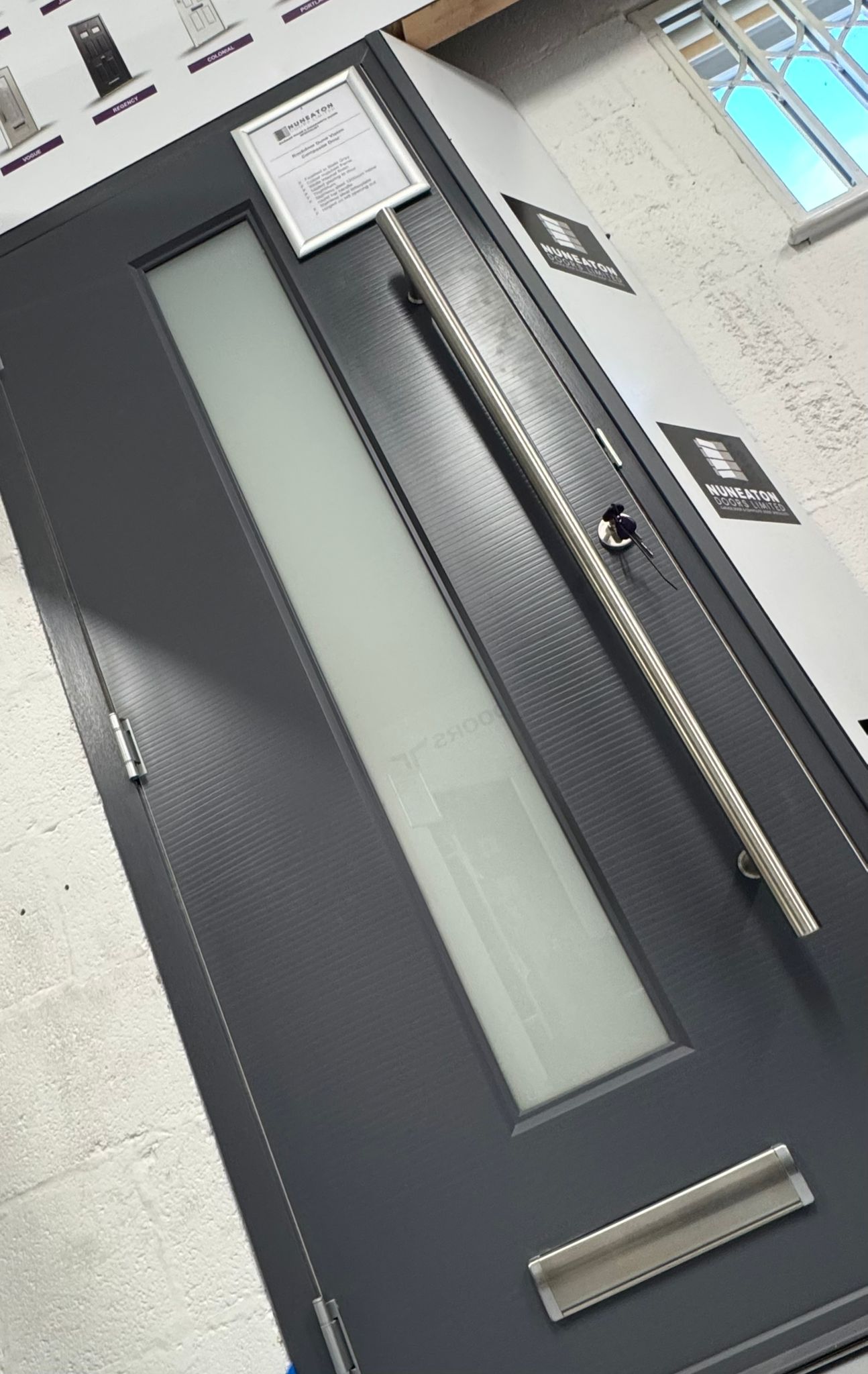 Dark grey composite Doors at The showroom